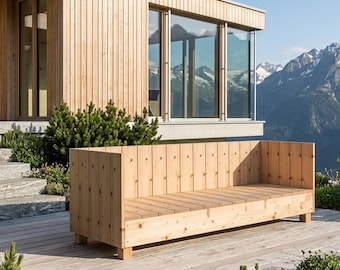 May include: A rectangular wooden bench with a slatted backrest and seat, constructed from light-colored vertical planks. The bench features a simple, boxy frame with four short, square legs, positioned on a wooden deck in an outdoor setting.