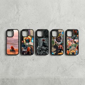 May include: Five black phone cases with different designs. The designs include a sunset scene, a collage of characters, a black and white image of a woman, a silhouette, and a colorful collage. The cases are arranged in a row.