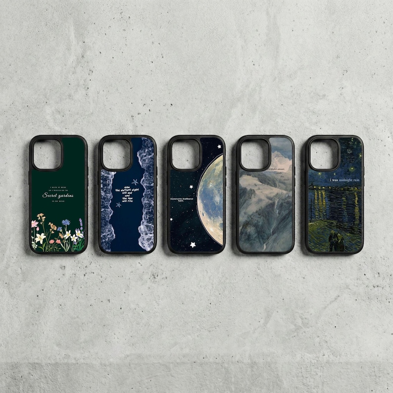 May include: Five black phone cases with various designs. One case displays flowers and the text "Secret gardens". Another features a night sky with stars and a crescent moon. The other cases have landscape and text designs.