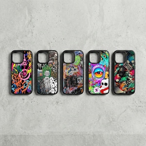 May include: Five black phone cases with unique graffiti art designs. Each case features a different vibrant color scheme, including neon pink, green, and orange. The designs incorporate various elements like eyes, skulls, and abstract patterns, creating a bold and artistic aesthetic.