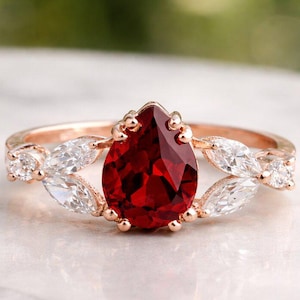 May include: A rustic wooden sign with the text "Welcome to our home" in white lettering. The sign features a distressed finish and a simple, inviting design, perfect for a front porch or entryway.