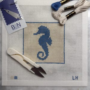 May include: A set of three ceramic mugs with a speckled, matte finish. The mugs are in shades of cream, light gray, and dark gray. Each mug has a simple, modern design and a rounded handle. Perfect for coffee or tea.