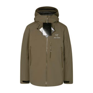 May include: A khaki-colored hooded jacket with a full-length zipper and multiple pockets. The jacket features the brand name "Arc'teryx" on the chest and a "GORE-TEX" tag. The jacket is designed for outdoor activities and protection from the elements.