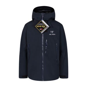 May include: Navy blue hooded jacket with a full-length zipper and multiple pockets. The jacket features the "GORE-TEX" and "ARC'TERYX" logos. A tag with the "GORE-TEX" logo is attached to the zipper.