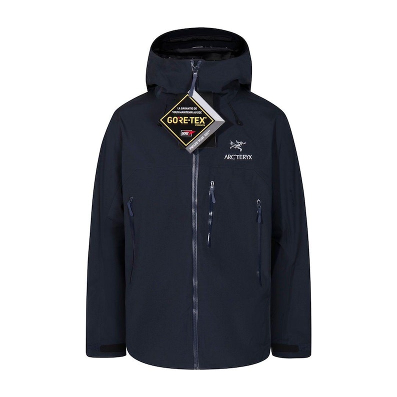 May include: Navy blue hooded jacket with a full-length zipper and multiple pockets. The jacket features the "GORE-TEX" and "ARC'TERYX" logos. A tag with the "GORE-TEX" logo is attached to the zipper.