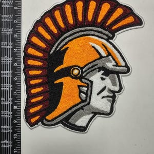 May include: A set of three ceramic mugs with a speckled, matte finish. The mugs are in shades of cream, light gray, and dark gray. Each mug has a simple, minimalist design, perfect for coffee or tea.