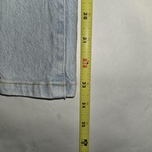Jeansy damskie Free People 25 niebieskie, rozkloszowane, swobodne, rozciągliwe zdjęcie 5