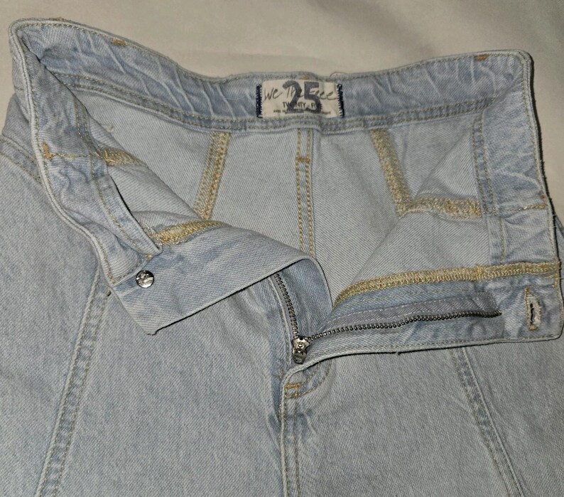 Jeansy damskie Free People 25 niebieskie, rozkloszowane, swobodne, rozciągliwe zdjęcie 4