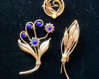 designer gold filled vintage brooches