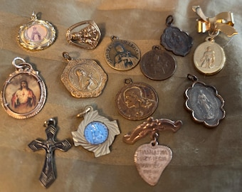 13 vintage religious medals/pendants/pins. Unique bunch of items