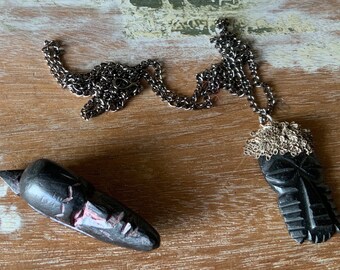 Carved ebony wood face pendants