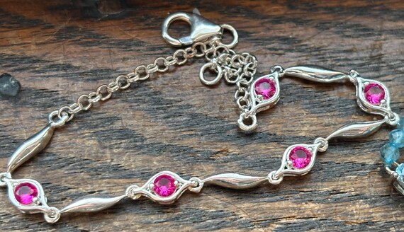Sterling silver ruby and topaz bracelets - image 4