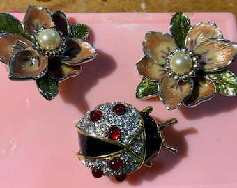 Joan Rivers flowered clip on earrings and ladybug brooch