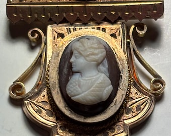 This item is a Victorian-era cameo pin/pendant, likely gold-filled or gold-plated with seed pearl accents/1880