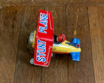 old Linemar / made in Japan, tin wind-up stunt airplane/1950