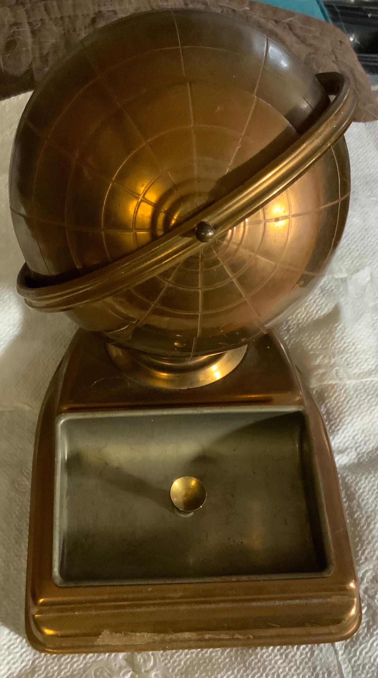 vintage brass globe cigarette holder 1950s Musical Dispenser 1950s Globe Cigarette Holder $175