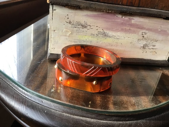 2 brown lucite bangel bracelets - image 1