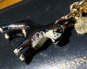 Designer Erwin Pearl Enamel Boxer with gold tone chain Bracelet.