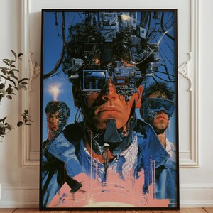 May include: A framed poster featuring a central figure with a complex array of electronic components and wires integrated into their head and face. Two additional figures with similar technological enhancements flank the centre, all set against a deep blue background with a pale pink graphic element at the bottom.