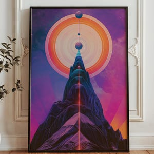 May include: Abstract art print featuring a mountain range with a vibrant color palette. The artwork includes a large circular design with concentric rings in orange and pink, and a vertical line of spheres.