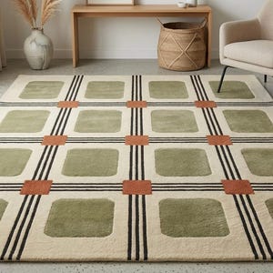 Può includere: Un tappeto rettangolare con sfondo color crema e un motivo a griglia formato da linee nere. Il design presenta quadrati color verde salvia dagli angoli arrotondati e quadrati più piccoli color terracotta alle intersezioni delle linee.