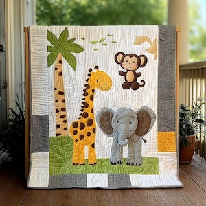 May include: A handmade baby quilt featuring a jungle theme. The quilt showcases a giraffe, elephant, and monkey appliqued on a white background. The quilt has a green, yellow, and brown color scheme, with a textured, quilted design.