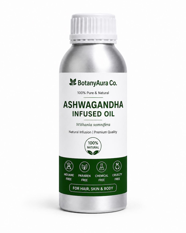 May include: A silver-colored metal bottle with a white screw-top cap. The label reads BotanyAura Co. 100% Pure & Natural ASHWAGANDHA INFUSED OIL Withania somnifera. It features icons for Hexane, Paraben, Chemical, and Cruelty Free for hair, skin & body.