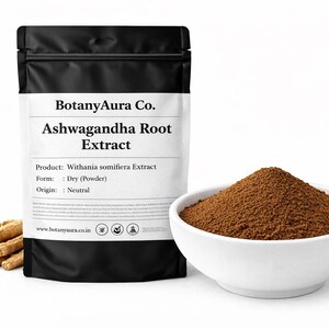 May include: A black pouch of Ashwagandha Root Extract powder from BotanyAura Co. is displayed next to a white bowl filled with brown powder and a small pile of dried roots. The product details are printed on the pouch.
