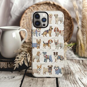 May include: A smartphone case featuring a repeating pattern of various dog breeds illustrated with textured fabric-like overlays in plaid, floral, and striped prints. The dogs are arranged in a grid on a light, neutral-coloured background.