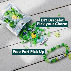 May include: A DIY bracelet kit with green and blue beads, a yellow duck charm, and flower charms. The text "DIY Bracelet Pick your Charm" is displayed. A completed bracelet with the word "WISH" is also shown.