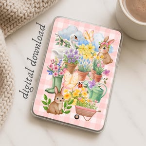 May include: A rectangular digital download print featuring a light pink and white gingham background with watercolor illustrations of two brown rabbits, a white swan, butterflies, a ladybug, potted flowers, a green watering can, and a wheelbarrow.