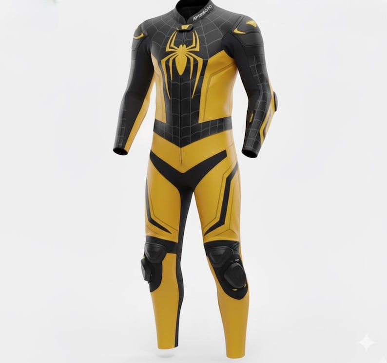 May include: A yellow and black motorcycle racing suit with a spider emblem on the chest. The suit has black accents on the shoulders, arms, and legs, with protective padding on the knees and elbows. The suit has the text "APM MOTO" on the collar.