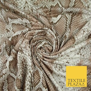 May include: A fabric featuring a repeating snakeskin pattern in shades of brown, tan, and off-white. The material is gathered in a central swirl, displaying the detailed scale texture across the surface. A yellow square with the text TEXTILE PLAZA O&P.