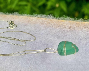 Jade seaglass charm pendant and sterling silver chain.