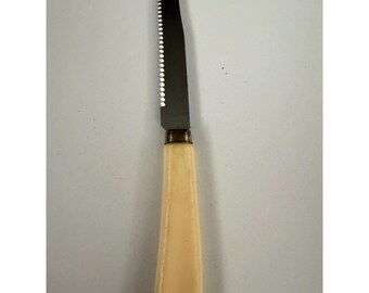 Vintage Quikut Stainless Steel Serrated Steak Knife USA Cream Handle Cutlery