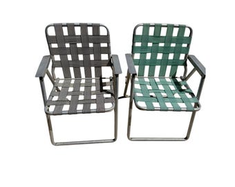 Juego de 2 sillas plegables de aluminio vintage para jardín, con correas tejidas, color verde azulado y gris, estilo retro.