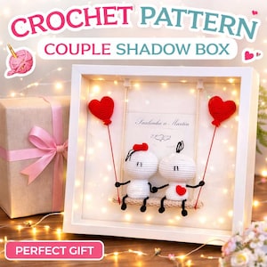 Puede incluir: Una caja de sombra de ganchillo con marco blanco con una pareja en un columpio, sosteniendo globos rojos en forma de corazón. El texto "CROCHET PATTERN COUPLE SHADOW BOX" está en la parte superior.