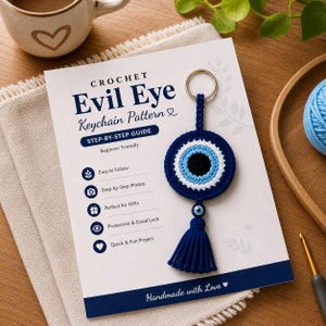 May include: A crochet Evil Eye keychain pattern guide with a blue, white, and black keychain. The guide is titled "CROCHET Evil Eye Keychain Pattern" and includes the text "STEP-BY-STEP GUIDE". The keychain has a blue tassel and a gold-colored ring.