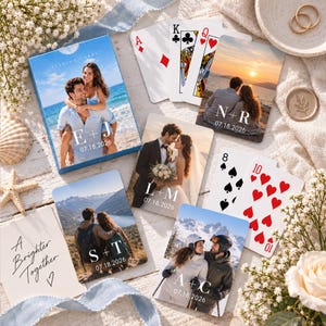May include: A custom deck of playing cards featuring various couple photographs, initials, and the date 07.18.2026 printed on the box and individual cards. The set includes standard playing card faces and a card with the text A Brighter Together.