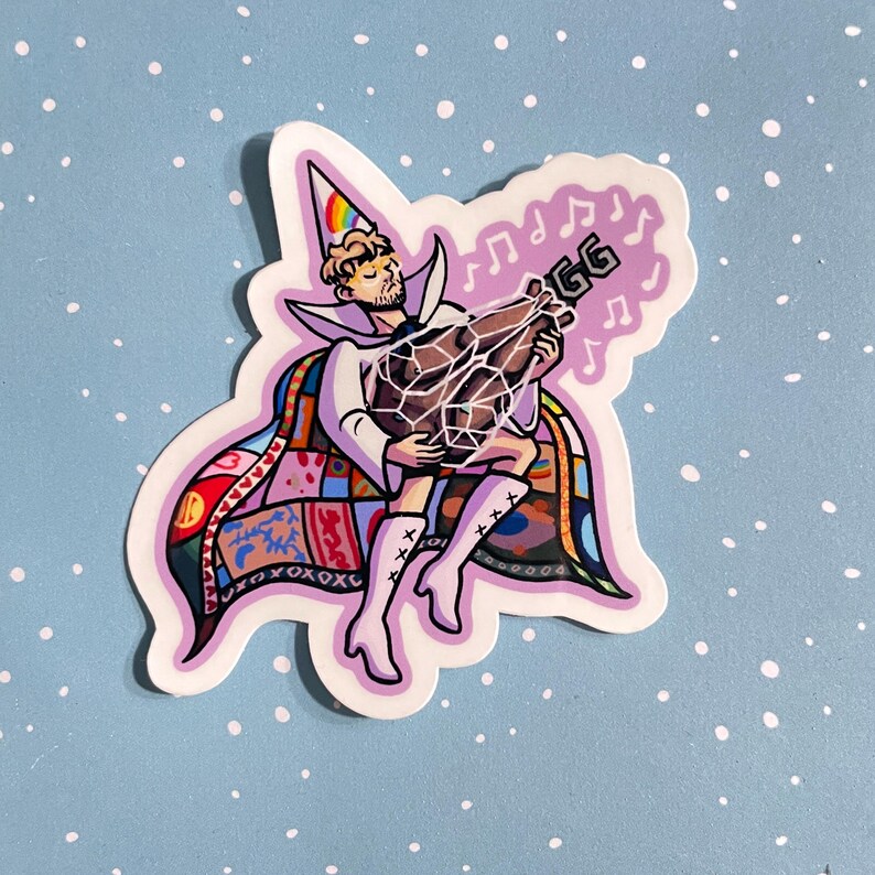 May include: A die-cut sticker featuring a person in a white outfit, a rainbow-striped cone hat, and a colorful patchwork cape. The person holds a brown roasted turkey with a white net, while musical notes float in a light purple cloud above.