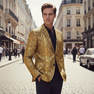 Może przedstawiać: Zestaw trzech ceramicznych kubków z nakrapianym, matowym wykończeniem. Kubki są w odcieniach kremu, jasnoszarym i ciemnoszarym. Każdy kubek ma prosty, minimalistyczny design, idealny do kawy lub herbaty.