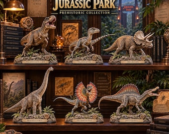 May include: A Jurassic Park Prehistoric Collection set featuring six detailed dinosaur figures: Tyrannosaurus Rex, Velociraptor, Triceratops, Brachiosaurus, Dilophosaurus, and Spinosaurus. Each figure stands on a rocky base with a nameplate.