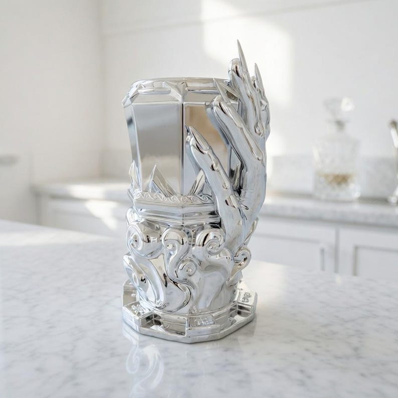 A professional collage showcasing over 20 unique 3D printable STL models for beer mugs and can holders. The image features high-detail designs including a horned Minotaur with gold accents, a gothic skull wearing aviator goggles, and a steampunk gas mask style tankard with copper pipes. The background displays various mythical, viking, and dark fantasy themed mugs in metallic silver and bronze finishes. Large yellow and blue 3D text in the center reads '20+ Can Holder & Beer Mug STL'.