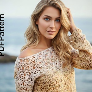 May include: A beige, off-the-shoulder crochet sweater with long sleeves. The sweater has a delicate, openwork pattern. The image also includes the text "Digital - Download PDF Pattern" in a vertical orientation on the left side of the image.