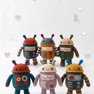 May include: A collection of six handmade crochet robot dolls in various colors. Each robot features a rounded head, antenna, and a body with button and patch details. The color palette includes orange, blue, green, yellow, and purple.