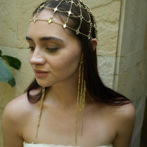 Gold chain headpiece with matching long shoulder duster earrings