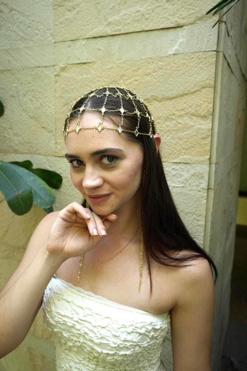 Festival headpiece and earrings styled with boho outfit