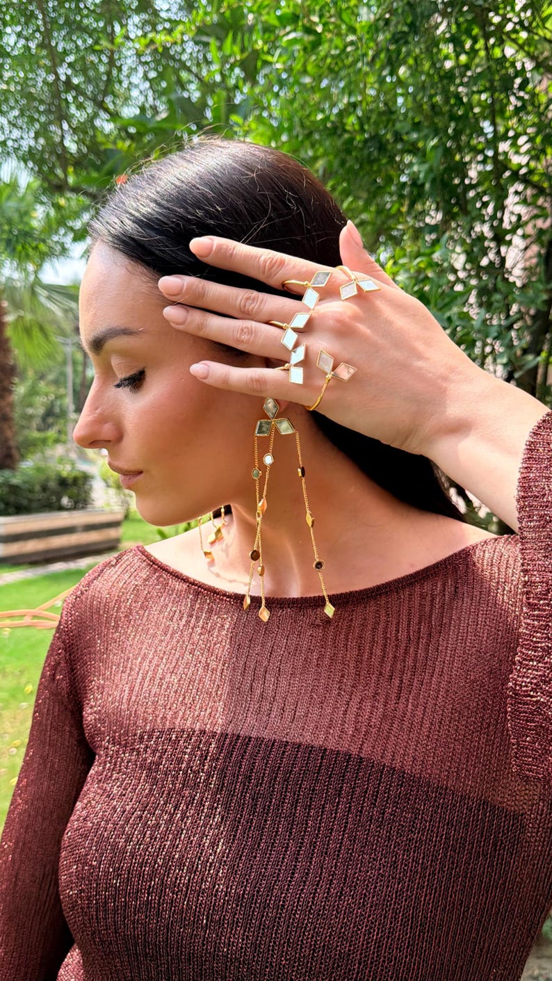 Mirror detailed handcrafted brass cuff
Lightweight statement hand harness jewelry