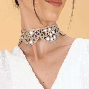Statement lace necklace styled for evening and party wear
