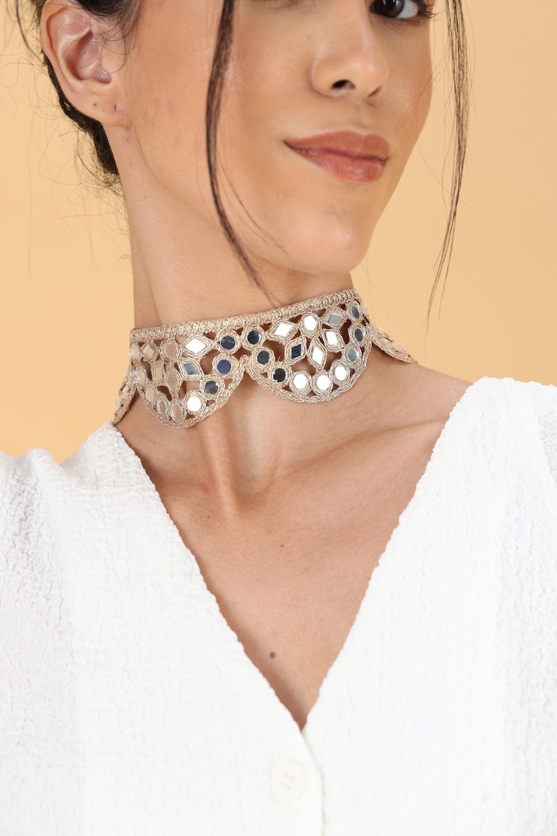 Statement lace necklace styled for evening and party wear